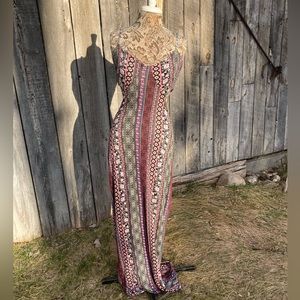 Colorful maxi sundress with cutouts by California Gypsy L 95% rayon 5% spandex.
